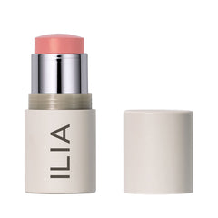 ILIA Multi-Stick The Mood swatch on skin for warm peach glow.