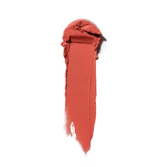 ILIA Multi-Stick applied to lips and cheeks for seamless color.
