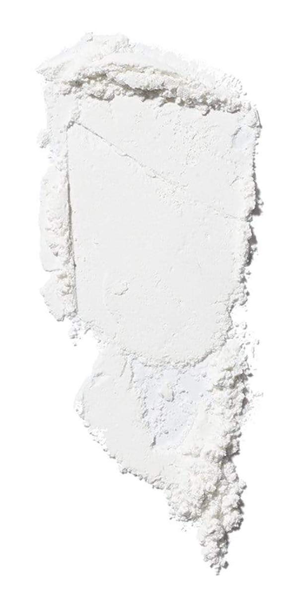 ILIA Soft Focus powder swatch on skin shows lightweight texture with glow.