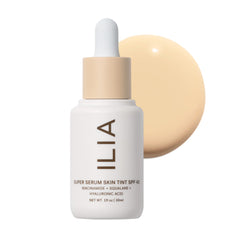 ILIA Super Serum Skin Tint bottle with dewy finish and mineral SPF protection.