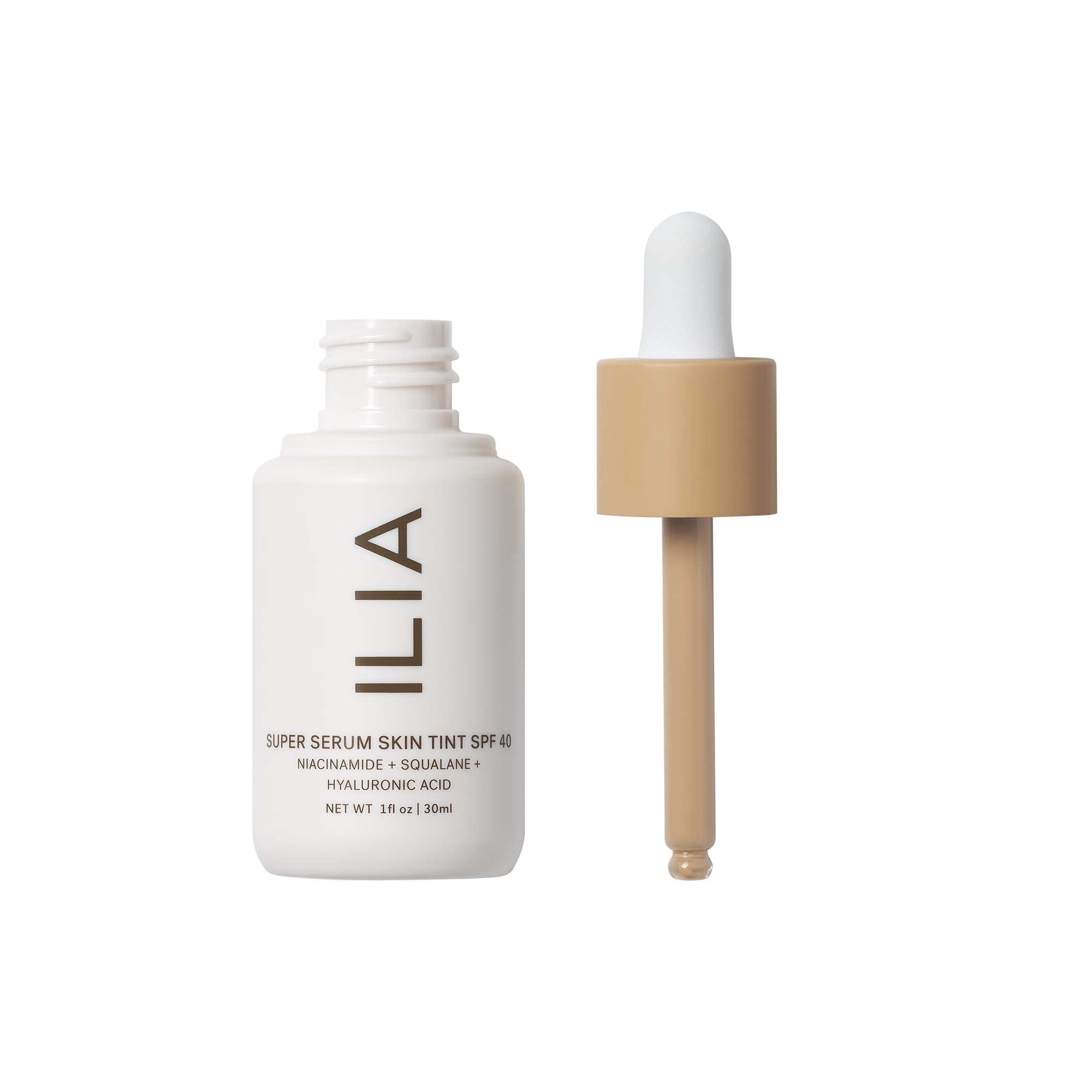 ILIA Super Serum Skin Tint SPF 40 application close-up shows seamless layering with other products.
