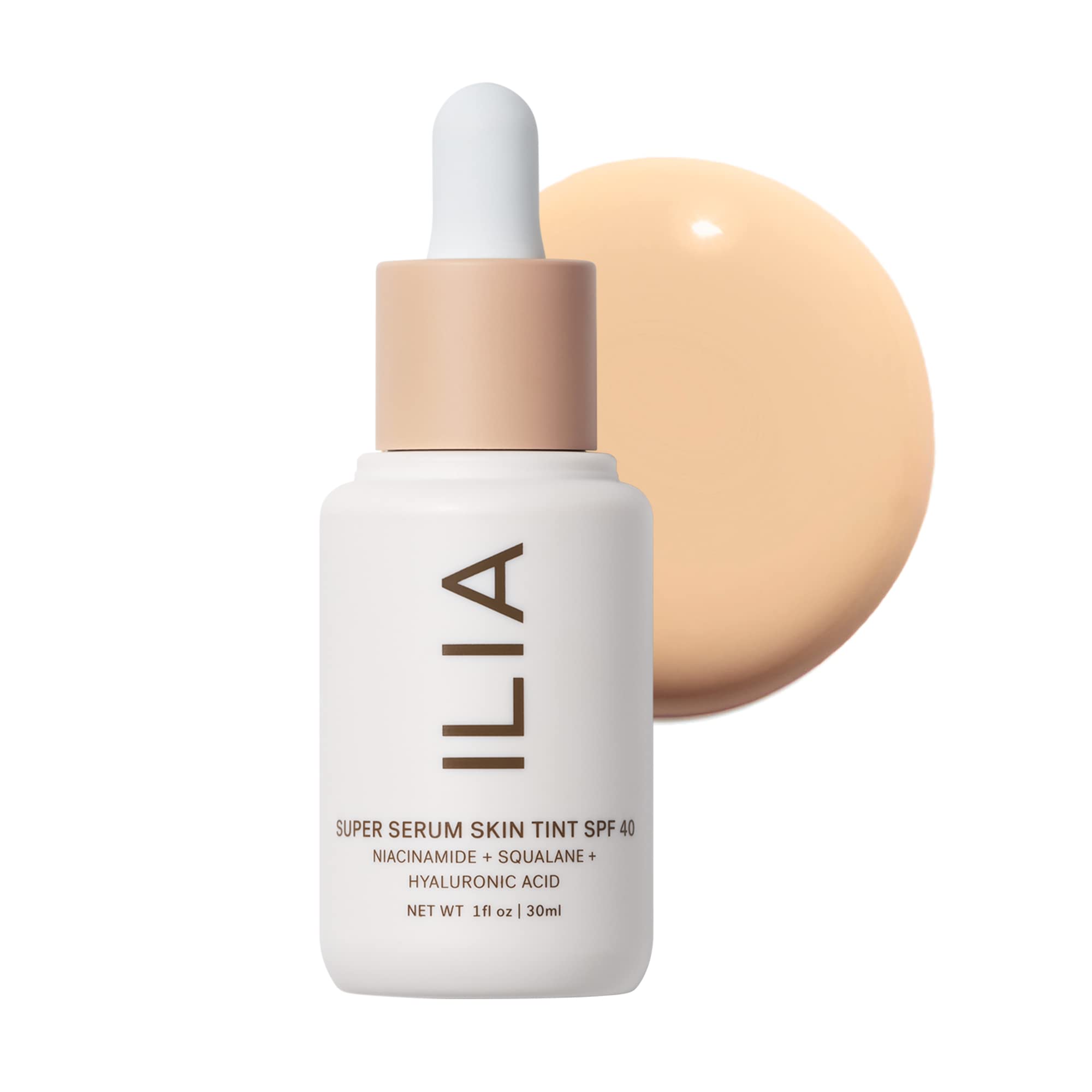 ILIA Super Serum Skin Tint SPF 40 bottle closeup shows dewy hydration and SPF protection.