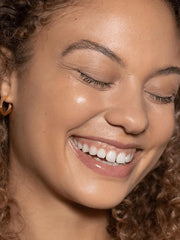 Swirl on skin demo of ILIA tint for natural glow and light coverage