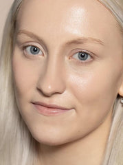 ILIA tint swatch on skin demonstrates hydrating base with sheer coverage.
