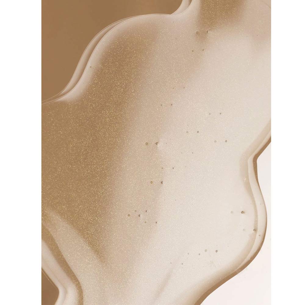 ILIA True Skin Radiant Priming Serum on skin shows tightened pores and silky finish.