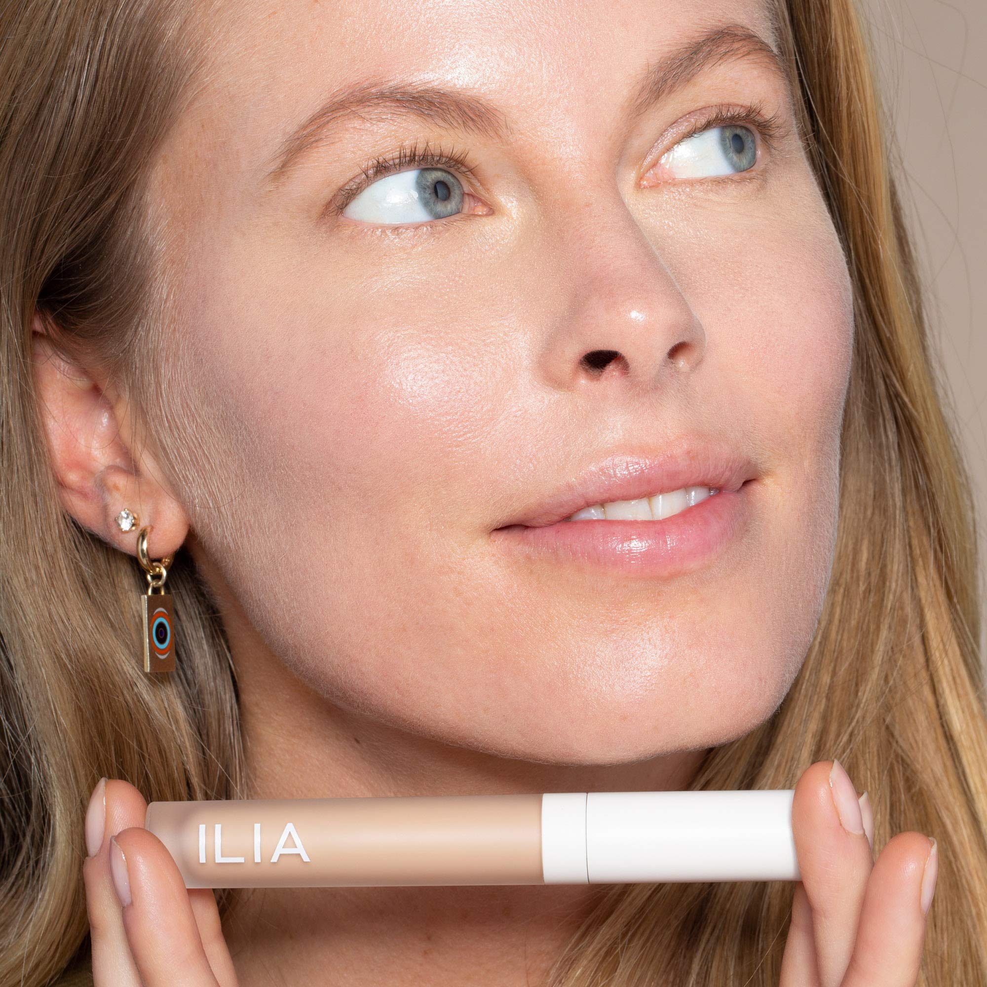 ILIA True Skin Serum Concealer application swatch reveals creamy texture for seamless blending