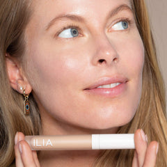 ILIA True Skin Serum Concealer application swatch reveals creamy texture for seamless blending