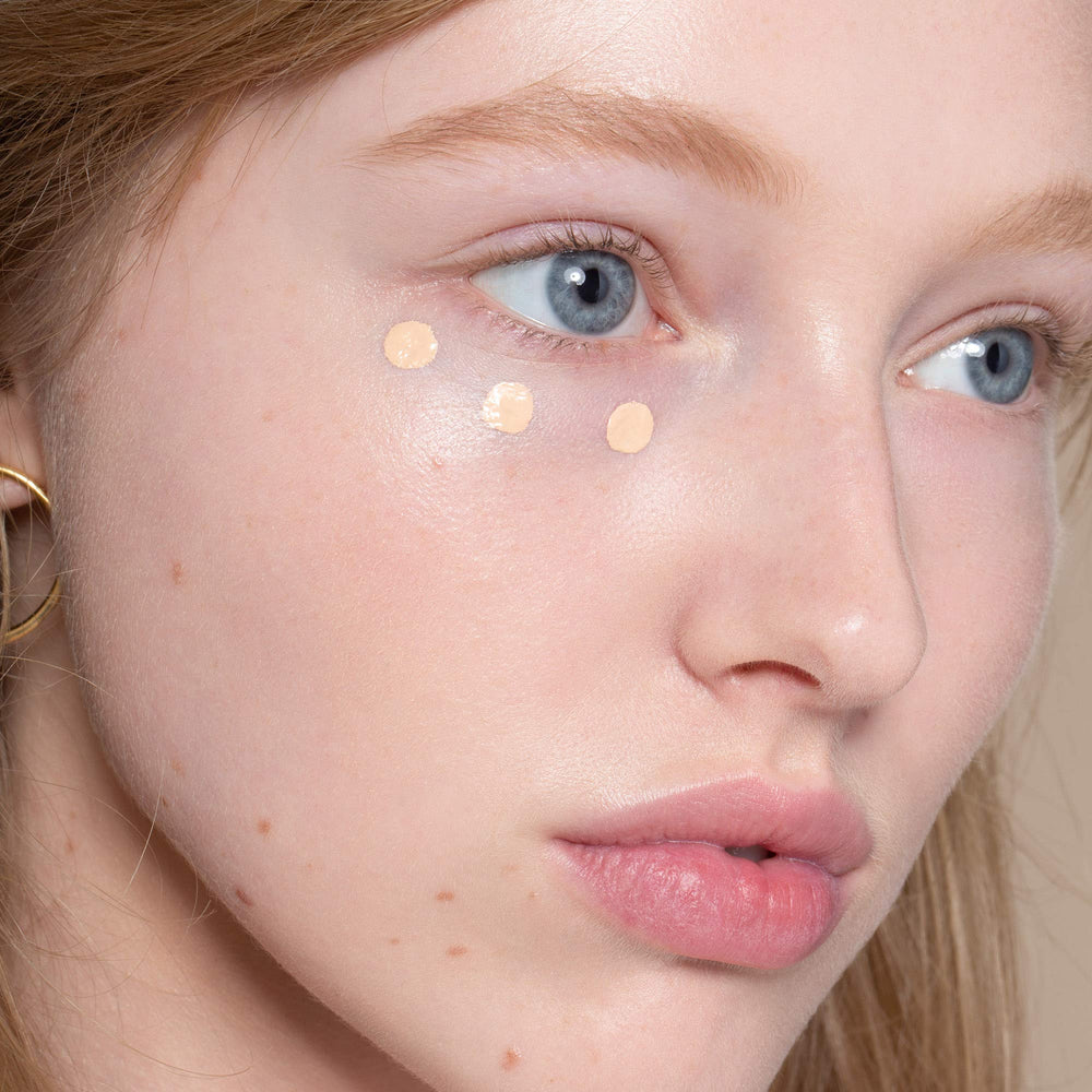 ILIA True Skin Serum Concealer close-up of dark circles reduction