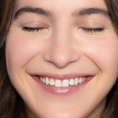 ILIA True Skin Serum Foundation application brush demonstrates seamless blending.