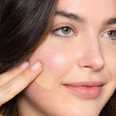 ILIA True Skin Serum Foundation swatch on arm showcases buildable coverage.