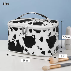 IMCUZUR cow print bag interior main compartment and brush slot for easy makeup access.