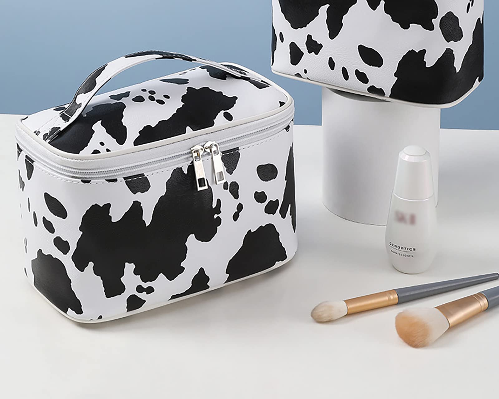 IMCUZUR cow print bag waterproof fabric protects contents from spills and dust.