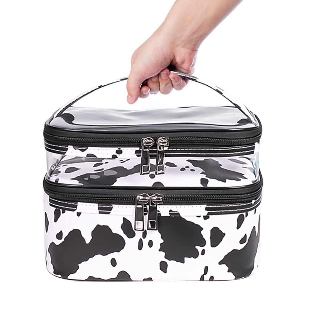 Imerelez cow print makeup bag material closeup shows durable vegan leather.