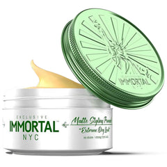 Immortal NYC Matte Styling Extreme Dry Look Pomade bottle closeup showing strong matte hold.