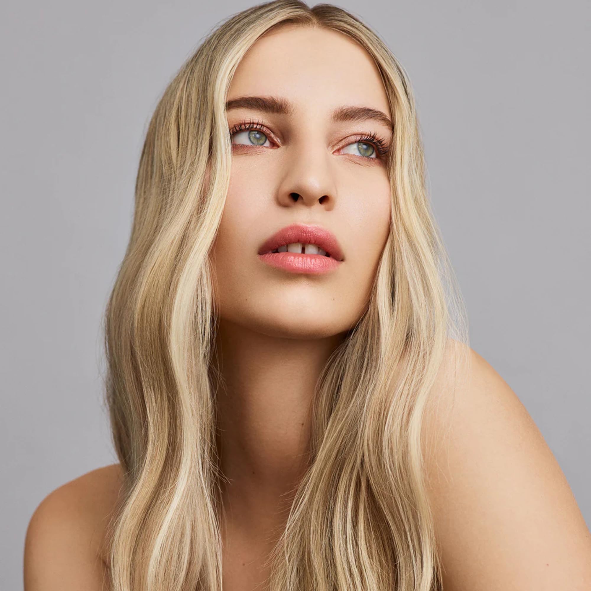 IN COMMON Magic Myst Universal Hair Elixir mist application on damp hair for detangling