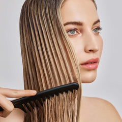 IN COMMON Magic Myst Universal Hair Elixir applied to wet hair detangles and softens