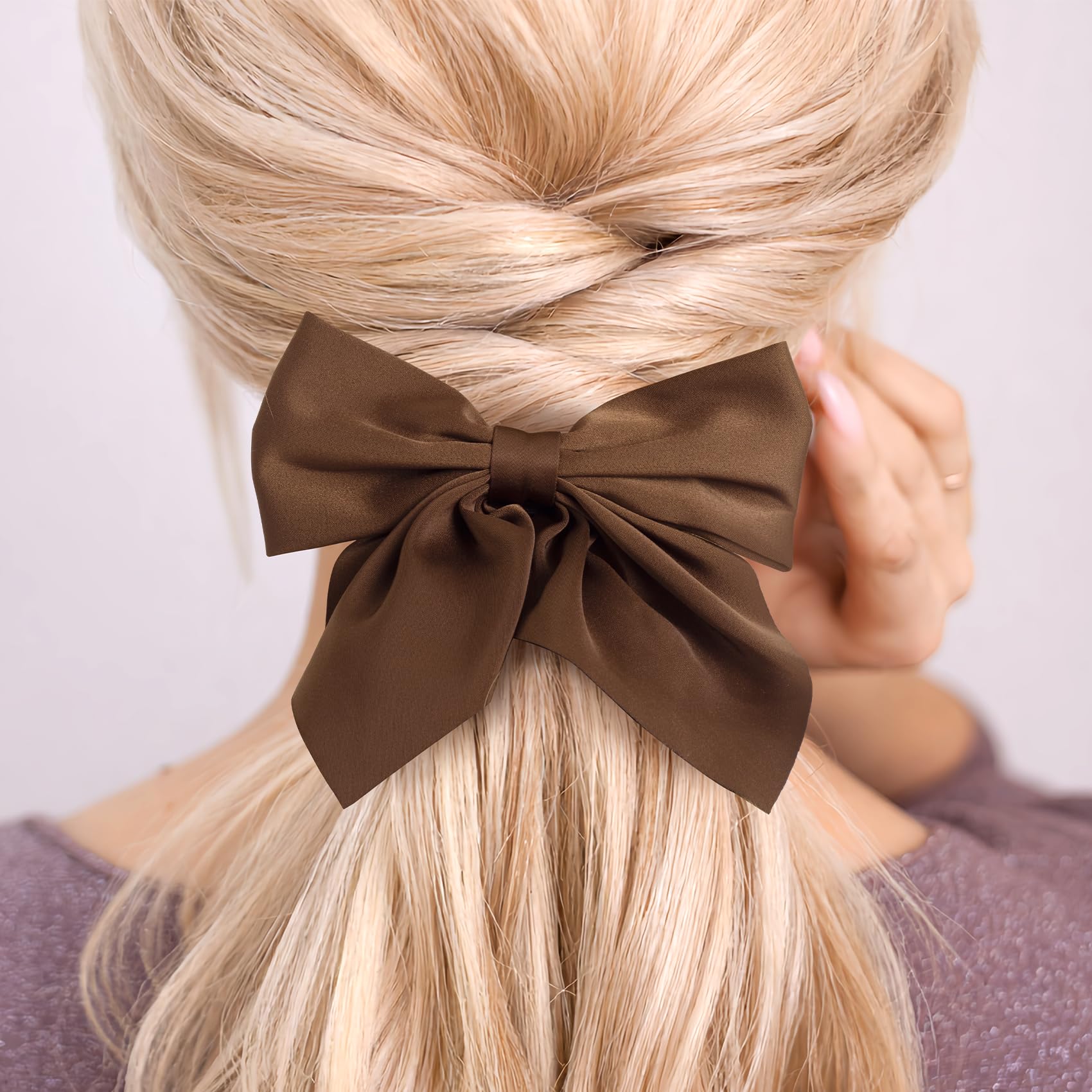 Incinkod hair bows close-up fabric details show satin texture.