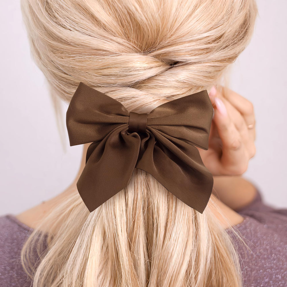 Incinkod hair bows close-up fabric details show satin texture.