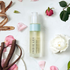 Indie Lee Purifying Face Wash foam forming rich lather for gentle cleansing