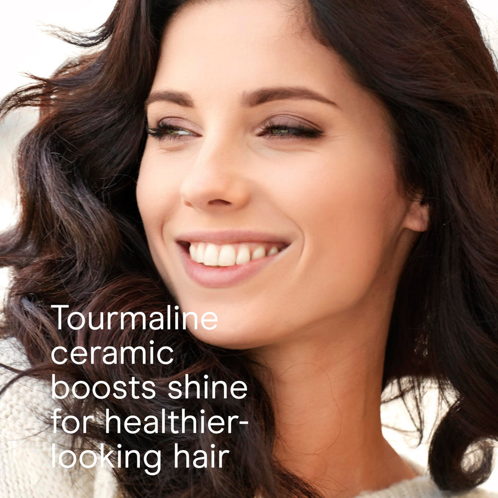 Conair INFINITI PRO anti-static bristles glide through hair for smoother brushing.