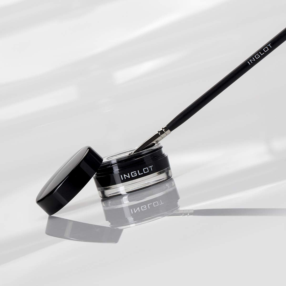 Inglot AMC Eyeliner Gel swatch on skin reveals bold pigment payoff.