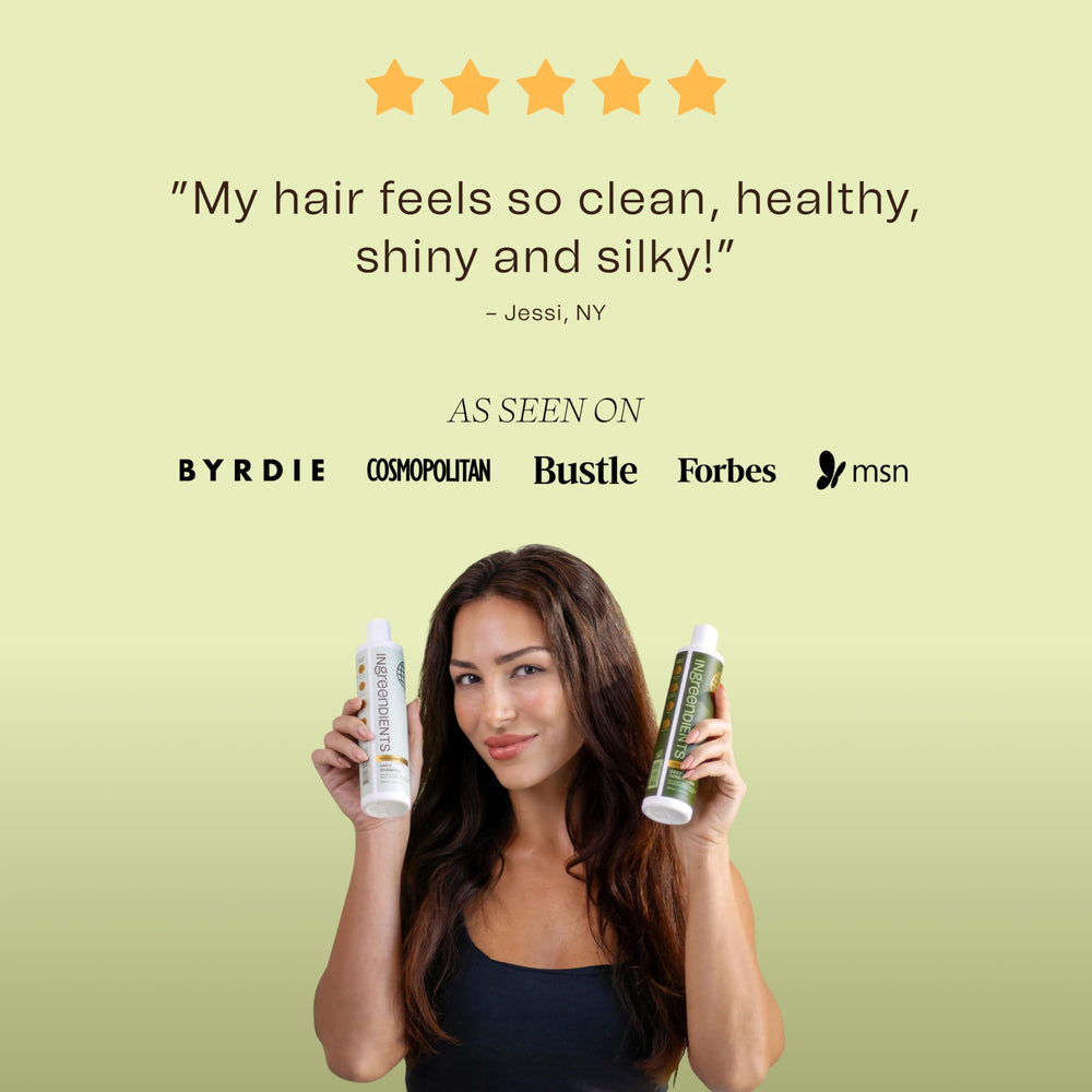 Ingreendients tea tree oil drop suggesting refreshing aroma and scalp clarity.