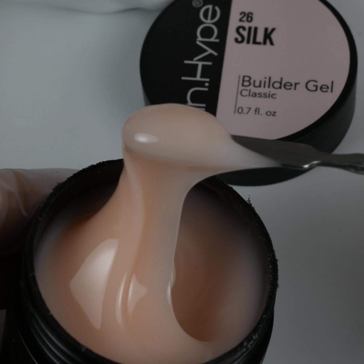 IN.HYPE camouflage finish on a natural nail shows lasting protection and polish