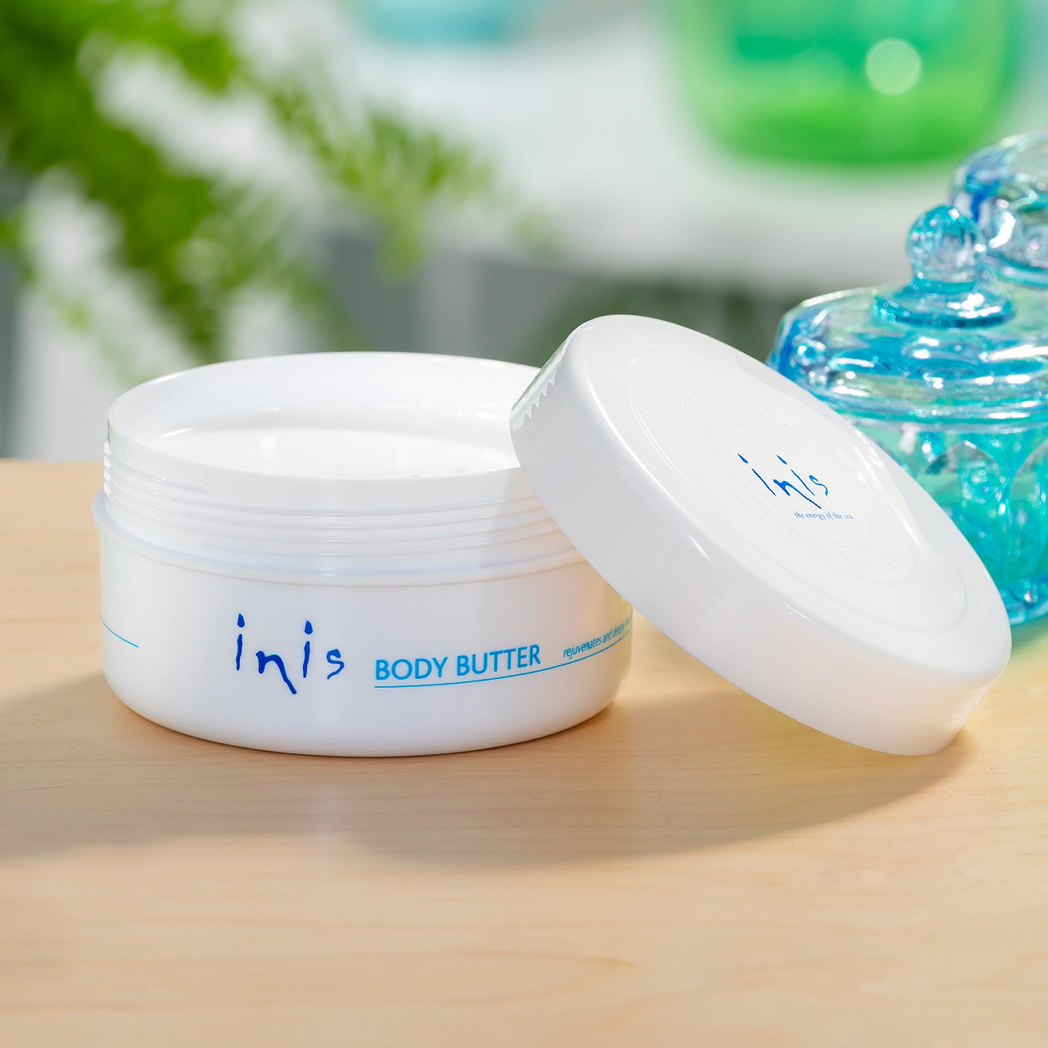Inis Energy of the Sea butter being applied to skin for deep moisturization.