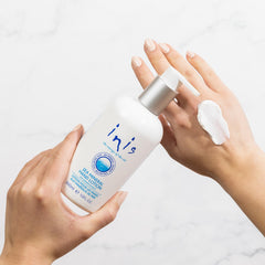 Inis the Energy of the Sea mineral hand lotion shea butter grapeseed oil closeup signals deep nourishment.