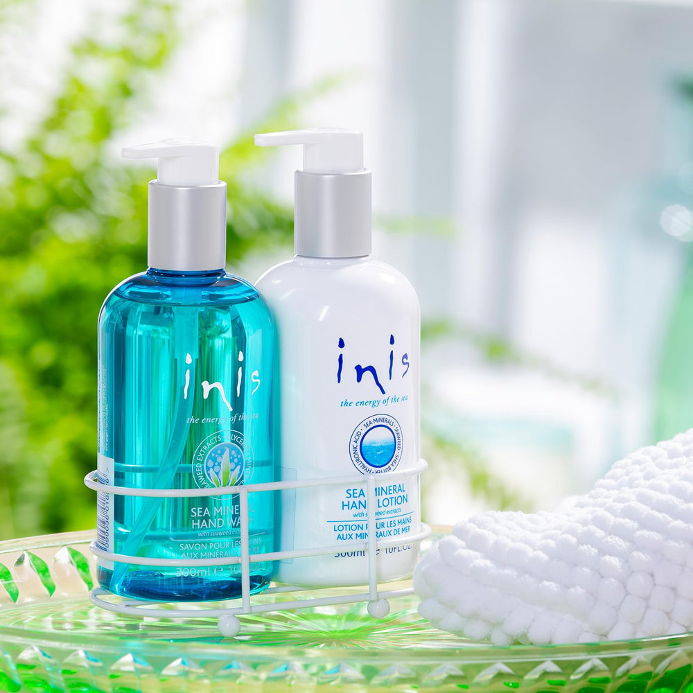Inis Energy of the Sea hand lotion bottle closeup highlights rich moisture from shea and oils.
