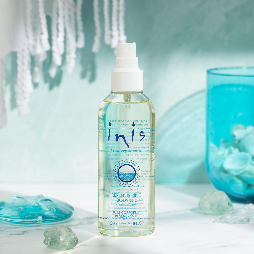 Inis replenishing body oil spray application demonstrates easy, fast-absorbing hydration.