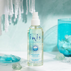 Inis replenishing body oil spray application demonstrates easy, fast-absorbing hydration.