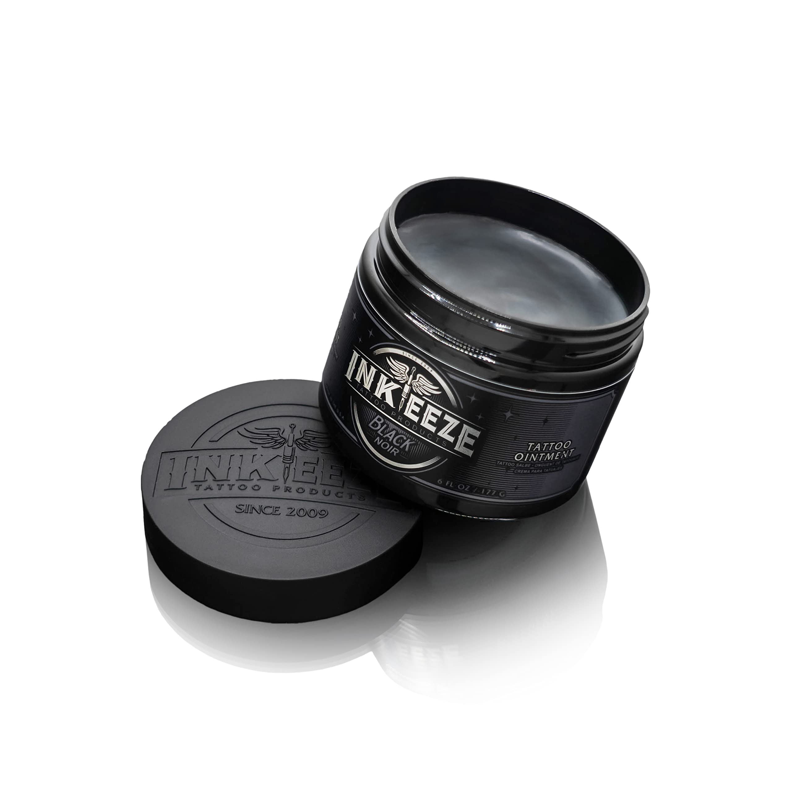 INK-EEZE Black Tattoo Ointment jar shows creamy texture ideal for easy application.