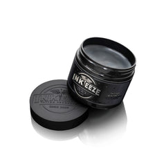 INK-EEZE Black Tattoo Ointment jar shows creamy texture ideal for easy application.