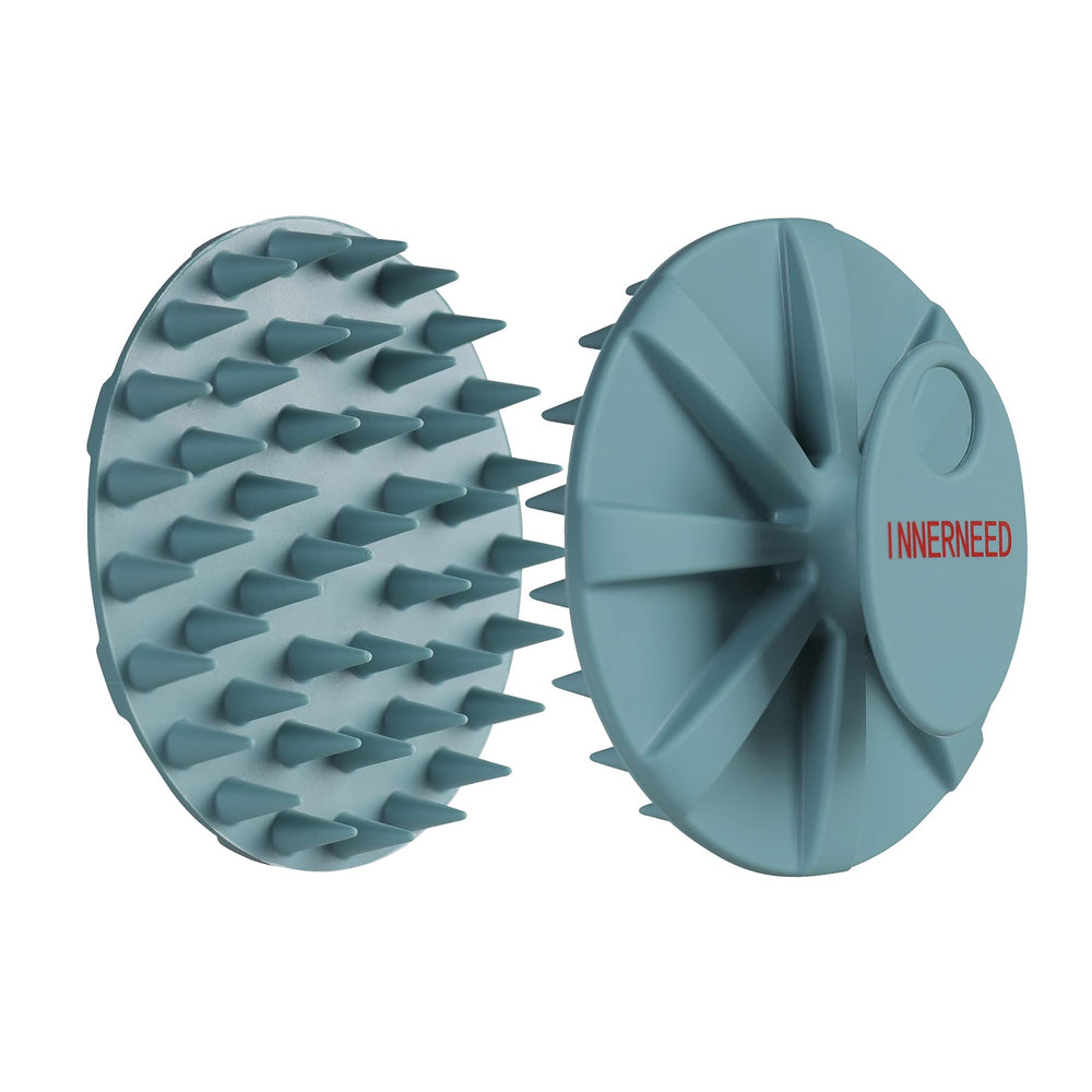 INNERNEED packaged scalp massager staged in bathroom for travel-ready convenience