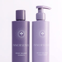INNERSENSE Bright Balance conditioner bottle shows nourishing oils for lasting softness and moisture.