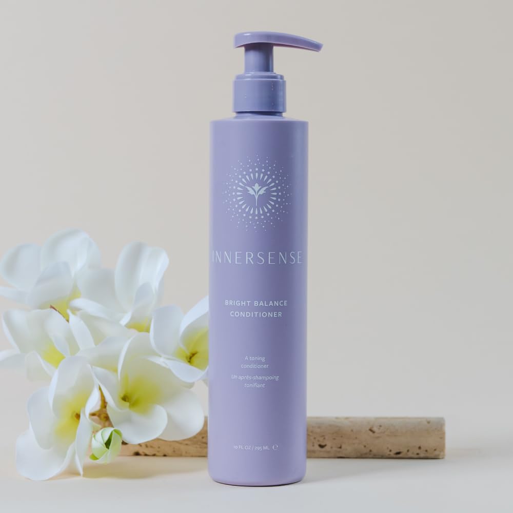 INNERSENSE Bright Balance Purple Toning Conditioner on bathroom shelf ready for routine.