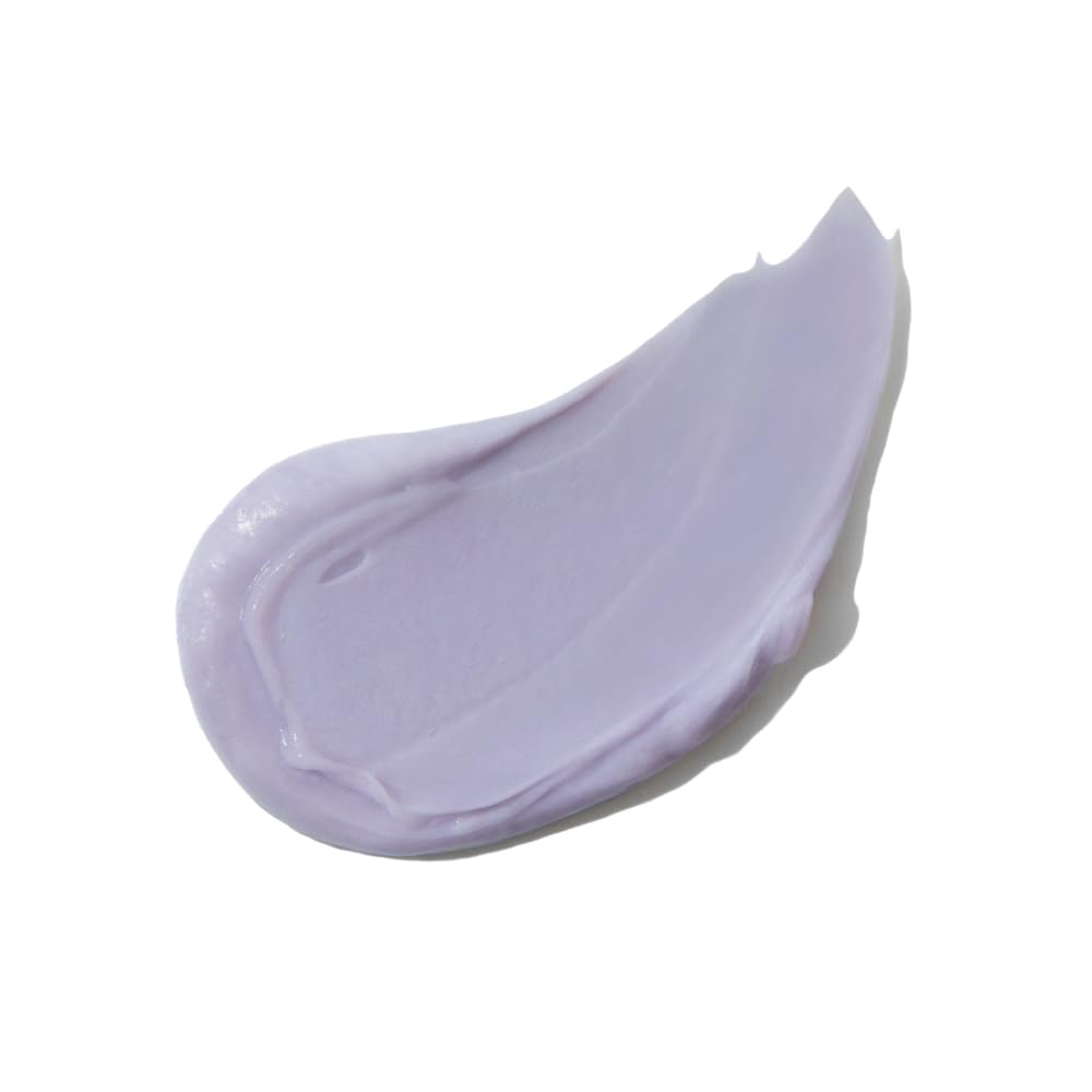 INNERSENSE Bright Balance Purple Toning Conditioner being poured for brass-neutralizing results.