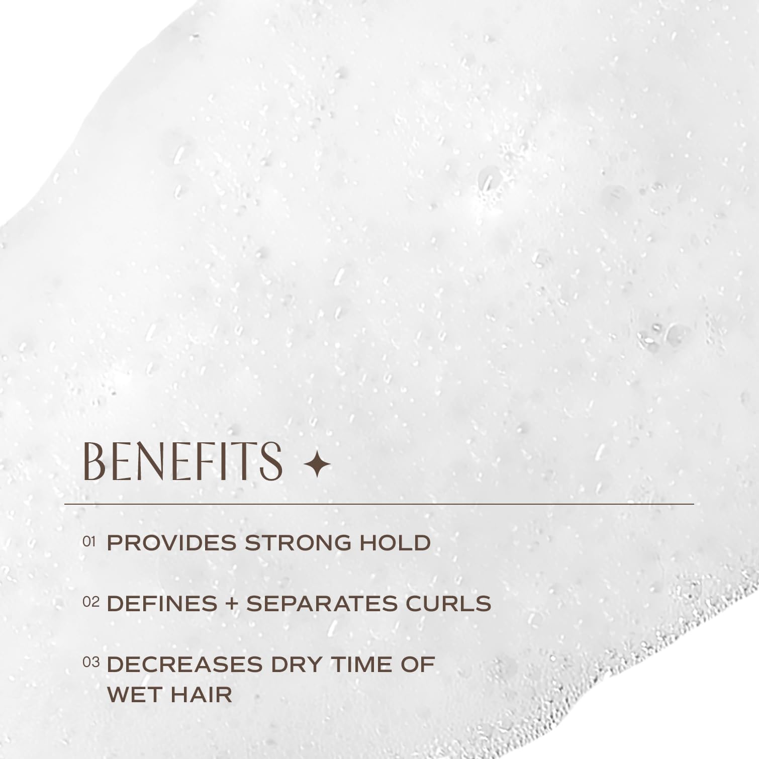 Applying INNERSENSE I Create Definition Styling Foam to wet hair.
