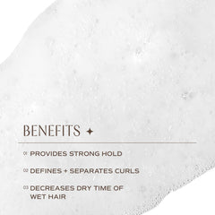 Applying INNERSENSE I Create Definition Styling Foam to wet hair.