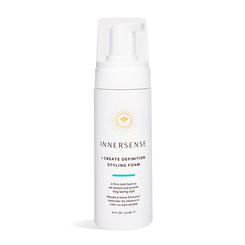 INNERSENSE I Create Definition Styling Foam bottle on a wooden vanity.