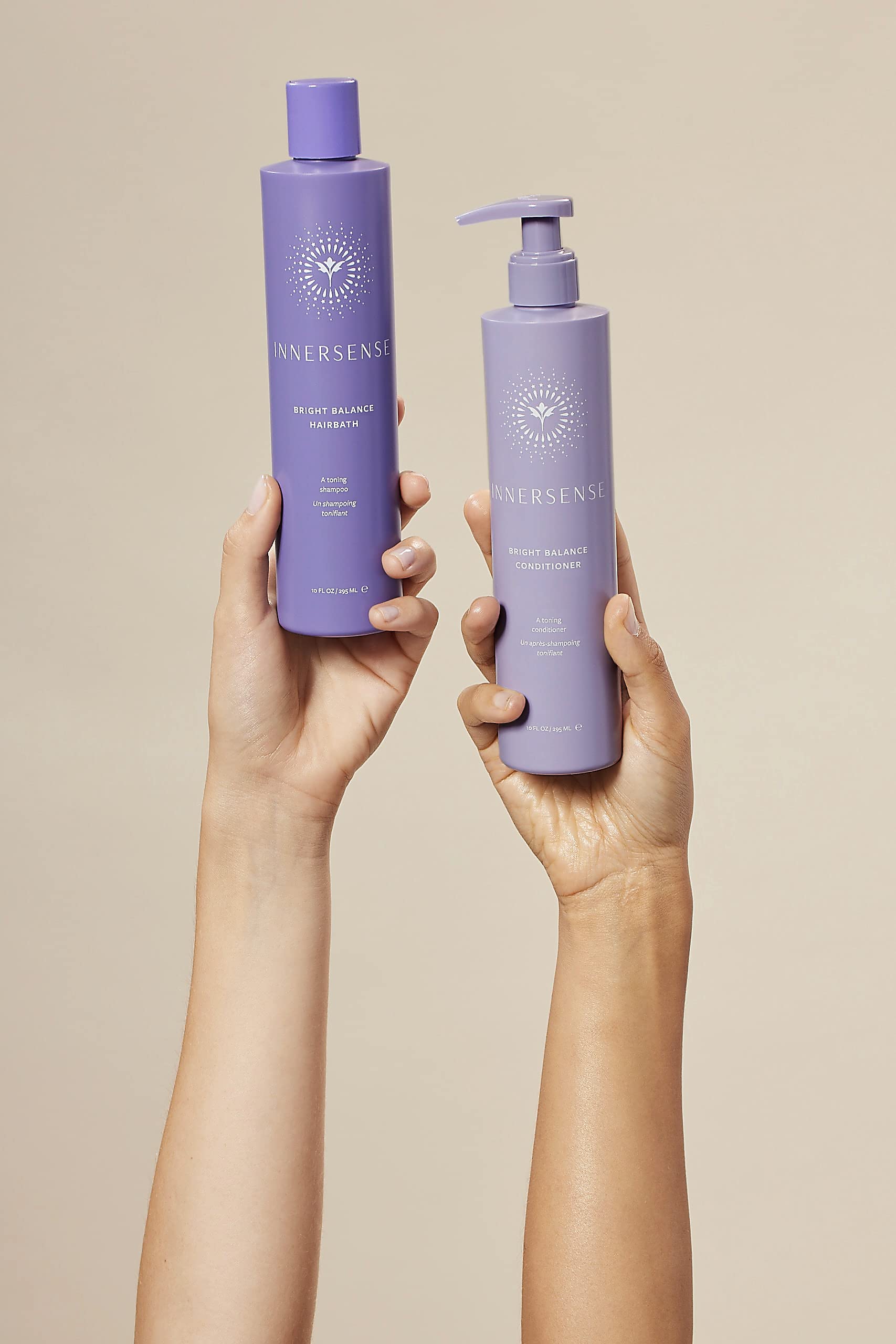 INNERSENSE purple-tinted product display conveys brass neutralizing benefits for bright tones.