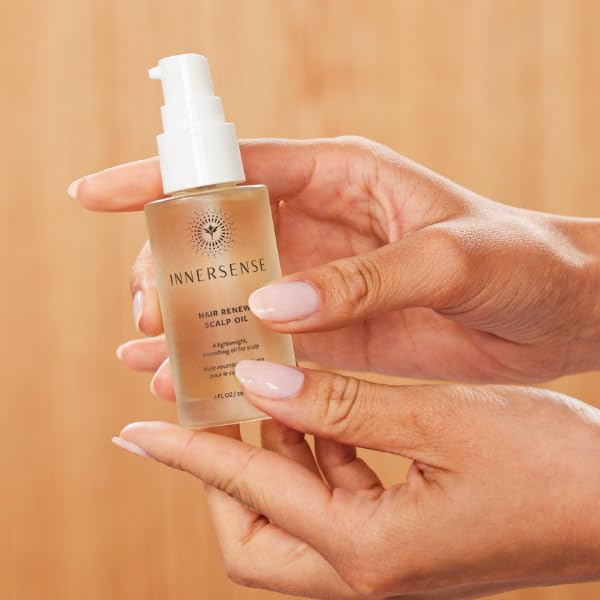 INNERSENSE scalp oil bottle closeup shows a lightweight, non-greasy formula.