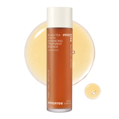 Innisfree Black Tea Youth Essence bottle close-up highlighting hydration and radiance.