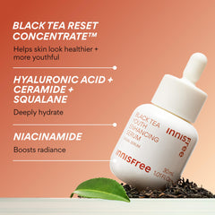 Innisfree Black Tea Youth Serum drops on hand demonstrate easy application