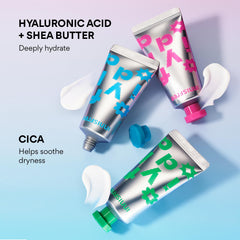 Three hand creams lined up, showcasing hydrating formulas.