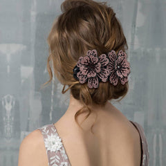 inSowni navy double flower clip adds subtle sparkle for everyday elegance