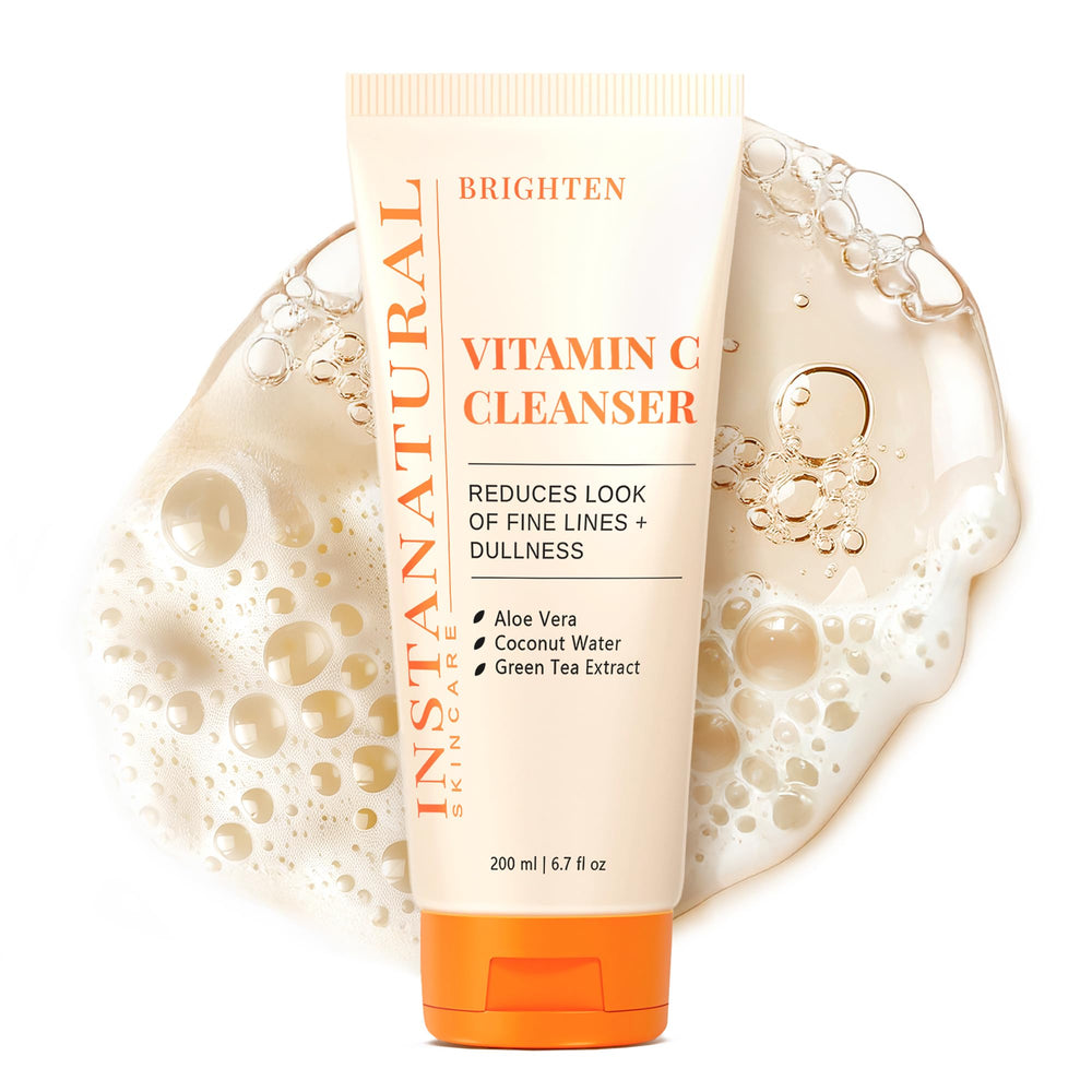 InstaNatural Vitamin C Cleanser bottle pour showcasing refreshing lather for brightening