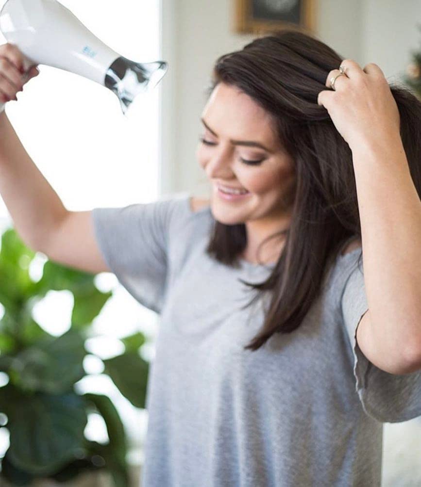 InStyler Turbo Ionic Blow Dryer concentrator attachment focuses heat for sleek styling.