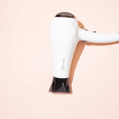 InStyler Turbo Ionic Blow Dryer diffusing air with diffuser attachment for curl bounce.